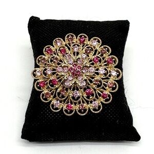 Monet Goldtone Floral Brooch with Pink and Purple Rhinestones